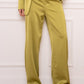 Pantalon satiné vert olive