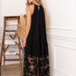 Robe noire chic et aérienne finition dentelle