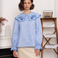 Chemise brodée col signature bleu ciel